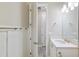 Clean bathroom featuring a vanity, mirror, and fixtures, accessible via connecting doors at 4419 Nw 54Th Ter, Ocala, FL 34482