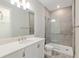 Stylish bathroom boasts modern fixtures, tiled shower, and ample lighting for a luxurious feel at 4419 Nw 54Th Ter, Ocala, FL 34482