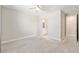 Bright bedroom with carpet floors and ensuite bathroom, offering a private and functional space at 4419 Nw 54Th Ter, Ocala, FL 34482