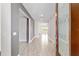 Inviting entryway with wood-look tile flooring and neutral paint, creating a bright and welcoming atmosphere at 4419 Nw 54Th Ter, Ocala, FL 34482