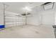 Clean, spacious two-car garage with a window at 4419 Nw 54Th Ter, Ocala, FL 34482