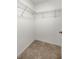 Walk-in closet offers ample storage space with multiple shelves to store all your favorite clothing at 458 Marion Oaks Trail Trl, Ocala, FL 34473