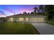 Charming single-story home with well-manicured lawn and two-car garage at 458 Marion Oaks Trail Trl, Ocala, FL 34473