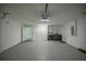 Spacious garage featuring ample storage cabinets and a convenient laundry area at 458 Marion Oaks Trail Trl, Ocala, FL 34473