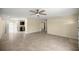 Spacious living room with tile floors, neutral paint, and abundant natural light at 458 Marion Oaks Trail Trl, Ocala, FL 34473
