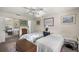 Bedroom with two beds and full length mirror at 505 Fairways Ln # B, Ocala, FL 34472