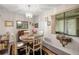Cozy dining room with a round table, chairs, and natural light from the window at 505 Fairways Ln # B, Ocala, FL 34472