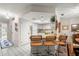 Open kitchen design with counter seating and direct view to dining area at 505 Fairways Ln # B, Ocala, FL 34472