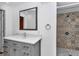 Bathroom with designer tile and quartz countertop at 510 Se 19Th St, Ocala, FL 34471