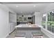 Bright kitchen with island, stainless steel appliances, and a view to the outdoors at 510 Se 19Th St, Ocala, FL 34471