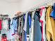 Spacious walk-in closet providing ample storage for clothes and shoes at 5233 Nw 43Rd Lane Rd, Ocala, FL 34482
