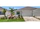 Beautiful single-Gathering home with a two-car garage and manicured front yard at 5233 Nw 43Rd Lane Rd, Ocala, FL 34482