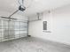 Spacious two-car garage with epoxy flooring and automatic door opener, perfect for storage or parking at 5233 Nw 43Rd Lane Rd, Ocala, FL 34482