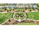 Overhead shot showcasing a park with a circular layout, winding paths, landscaping, and manicured lawns at 5233 Nw 43Rd Lane Rd, Ocala, FL 34482
