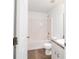 Well-lit bathroom with shower-tub combo and white vanity at 5596 Nw 57Th St, Ocala, FL 34482
