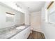Bright bathroom features a tub/shower combo and neutral-colored vanity at 5596 Nw 57Th St, Ocala, FL 34482