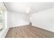 An airy room featuring wood-look floors and natural light at 5596 Nw 57Th St, Ocala, FL 34482