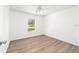 Bedroom boasts wood-look floors and great natural light at 5596 Nw 57Th St, Ocala, FL 34482