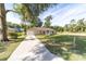 Charming single-Gathering home boasts a well-manicured lawn, large driveway, and attached garage at 5596 Nw 57Th St, Ocala, FL 34482