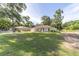 Lovely single-Gathering home with green lawn, attached garage, and picturesque neighborhood setting at 5596 Nw 57Th St, Ocala, FL 34482