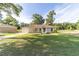 Charming single-Gathering home features a well-maintained lawn and inviting curb appeal at 5596 Nw 57Th St, Ocala, FL 34482