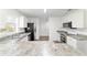 Bright kitchen with granite countertops, stainless steel appliances, and an open design at 5596 Nw 57Th St, Ocala, FL 34482