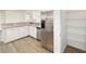 Bright kitchen with stainless steel appliances and bar-style countertop at 5596 Nw 57Th St, Ocala, FL 34482