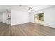 Bright living room with open floor plan, and wood-look floors throughout at 5596 Nw 57Th St, Ocala, FL 34482