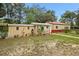Outbuilding offers flexible space for hobbies or storage, adding value to the property at 581 Ne 44Th Ave, Ocala, FL 34470
