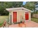 Versatile storage shed with double doors, perfect for organizing tools and equipment at 581 Ne 44Th Ave, Ocala, FL 34470