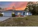 Charming single-story home with a well-maintained front yard and attached two car garage at 603 Marion Oaks Blvd, Ocala, FL 34473