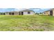 View of the backyard and exterior of the home at 6175 Sw 88Th Loop, Ocala, FL 34476