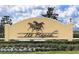 Elegant community entrance with horse imagery, reflecting the community's unique equestrian theme and upscale charm at 6175 Sw 88Th Loop, Ocala, FL 34476
