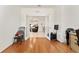 View through the doorway, showcasing hardwood floors, and an open-concept space, perfect for entertaining at 6175 Sw 88Th Loop, Ocala, FL 34476