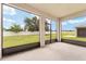Enclosed patio with a view of the backyard at 6175 Sw 88Th Loop, Ocala, FL 34476