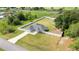 Beautiful single-story home with a two-car garage and fully fenced yard set among lush greenery at 6250 Se 88Th St, Ocala, FL 34472