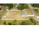 Aerial view of property featuring a house, fenced in yard, and a shed in the backyard at 6250 Se 88Th St, Ocala, FL 34472