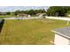 An aerial view of a home's fenced in back yard with plenty of room for outdoor activities at 6250 Se 88Th St, Ocala, FL 34472