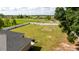 An aerial view showcases a home's large, fenced backyard with plenty of space for activities at 6250 Se 88Th St, Ocala, FL 34472