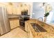 Beautiful kitchen featuring stainless steel appliances, stylish countertops, and ample storage at 6250 Se 88Th St, Ocala, FL 34472
