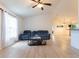 Inviting living area features plenty of natural light, vaulted ceilings, and an open floor plan at 6250 Se 88Th St, Ocala, FL 34472