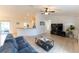 Bright living room boasts vaulted ceilings, light floors, and seamlessly connects to the kitchen at 6250 Se 88Th St, Ocala, FL 34472