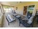 Comfortable seating on the screened patio, an excellent outdoor space at 6250 Se 88Th St, Ocala, FL 34472