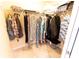 A walk-in closet with ample storage racks and shelving for organization at 6250 Se 88Th St, Ocala, FL 34472
