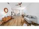 Stylish living room with an open layout, wood floors, and modern decor at 8905 Sw 76Th Ln, Ocala, FL 34481