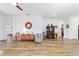 Spacious living room showcasing the light-colored wood floors at 8905 Sw 76Th Ln, Ocala, FL 34481