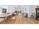 Bright and airy living room with wood floors and sliding glass doors to outdoor space at 8905 Sw 76Th Ln, Ocala, FL 34481