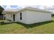 This is a back view of the house featuring a covered patio at 9 Hemlock Terrace Ln, Ocala, FL 34472