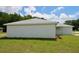 Picture showing the home from the side, highlighting its architectural details and well-kept outdoor space at 9 Hemlock Terrace Ln, Ocala, FL 34472