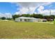 This single Gathering home has great curb appeal and plenty of yard space at 9 Hemlock Terrace Ln, Ocala, FL 34472